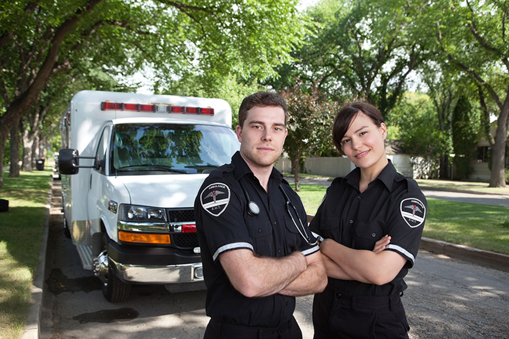 Two medics by ambulance