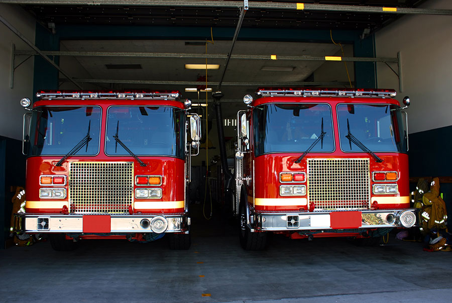 fire trucks in a fire station