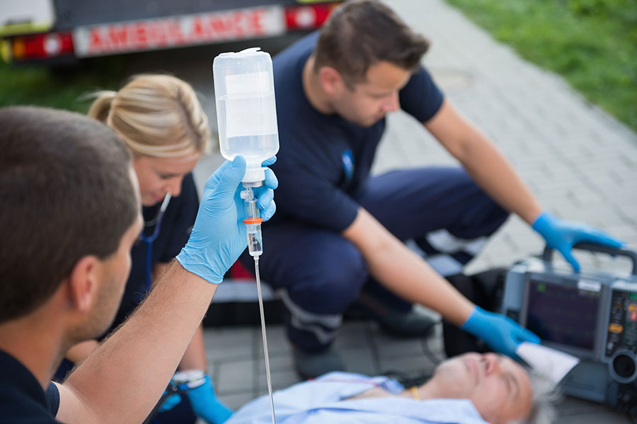 paramedics working on a patient